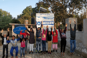 village-women-opening-water-atm-1